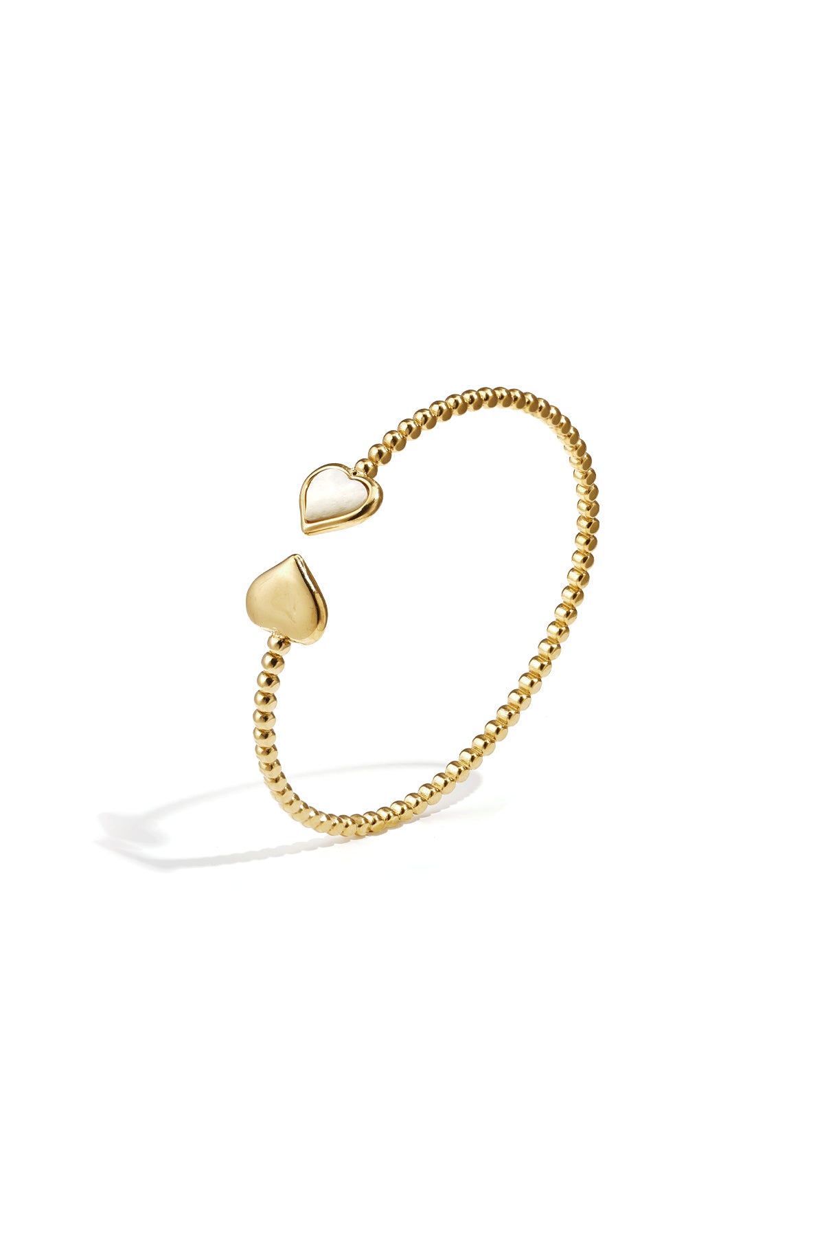 Brazalete con puntos simétricos y extremos detallados