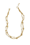 Collar en capas con lunares