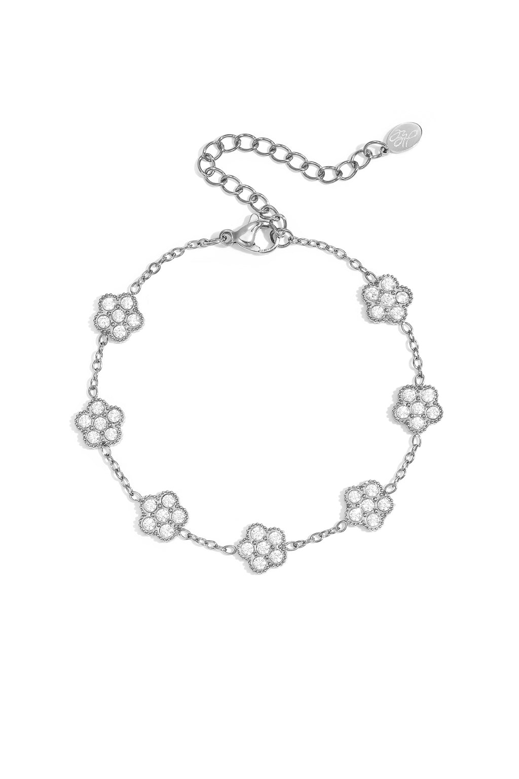 Elegante pulsera con flores engastadas con circonitas.