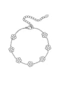 Elegante pulsera con flores engastadas con circonitas.