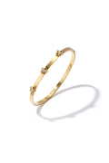 Pulsera con detalle floral y pedrería