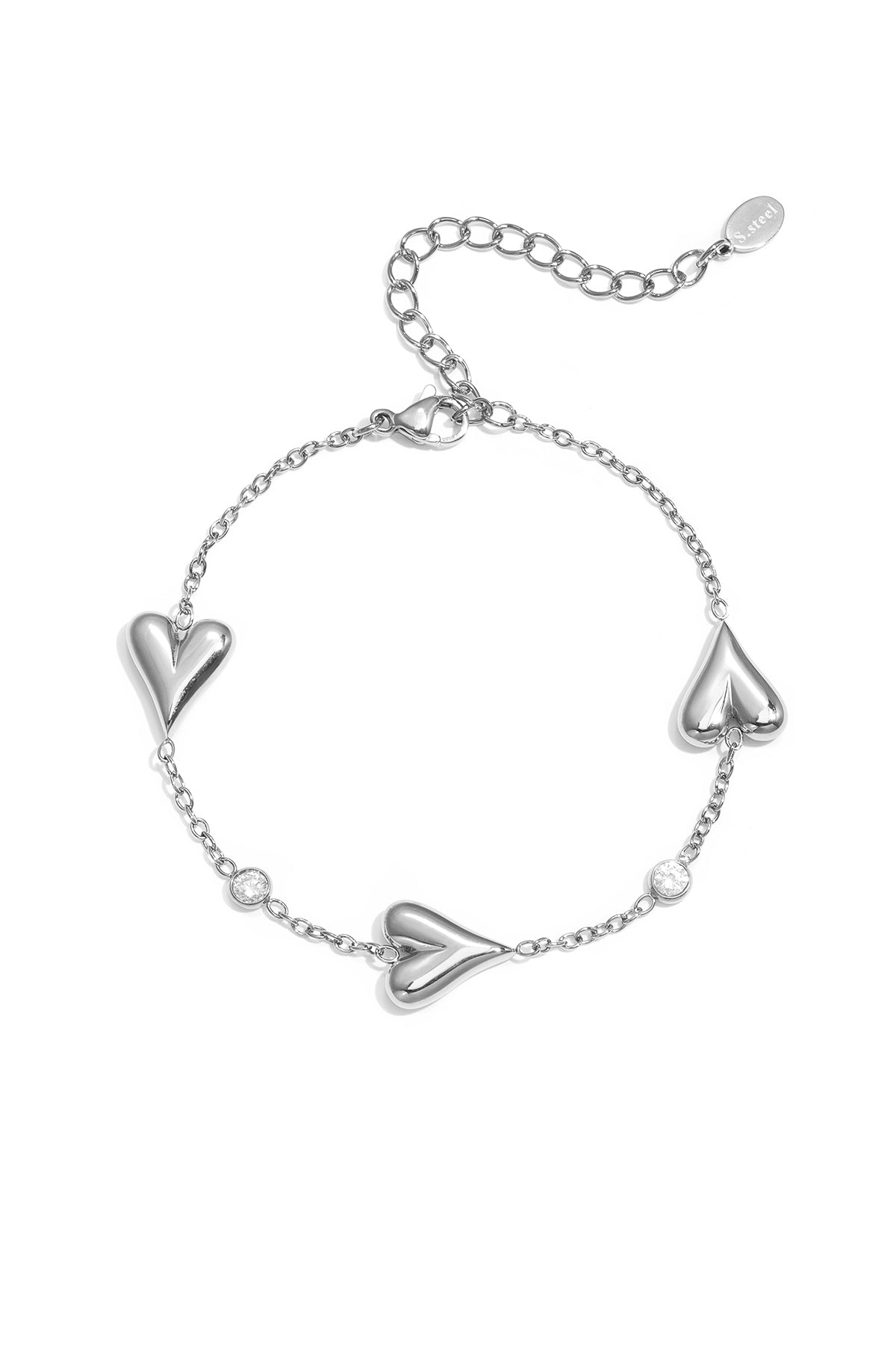 Pulsera con tres corazones macizos y piedras